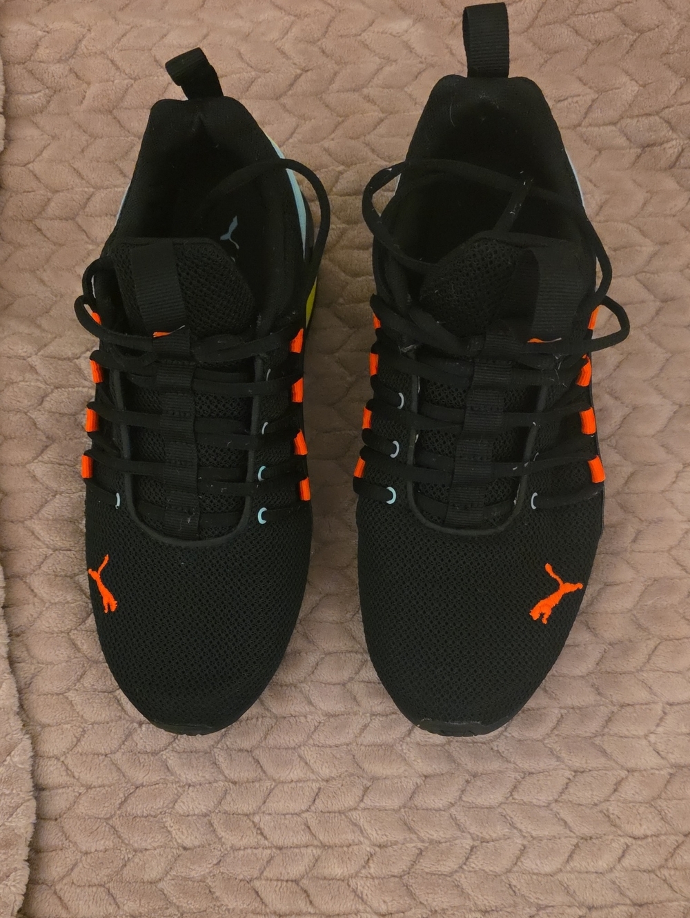 Puma Black Athletic Shoes with Orange Accents